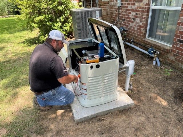 Technician servicing equipment to extend generator lifespan.